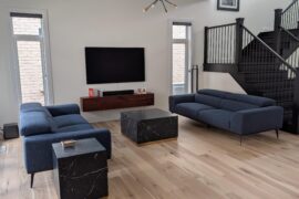 Rug or no-rug? Really love our hard wood floors but room is not cozy.