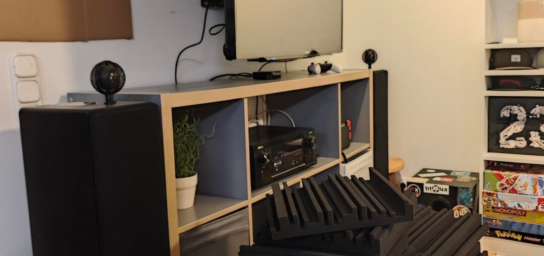 Attaching foam acoustic panels in the basement living/office room