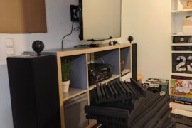 Attaching foam acoustic panels in the basement living/office room