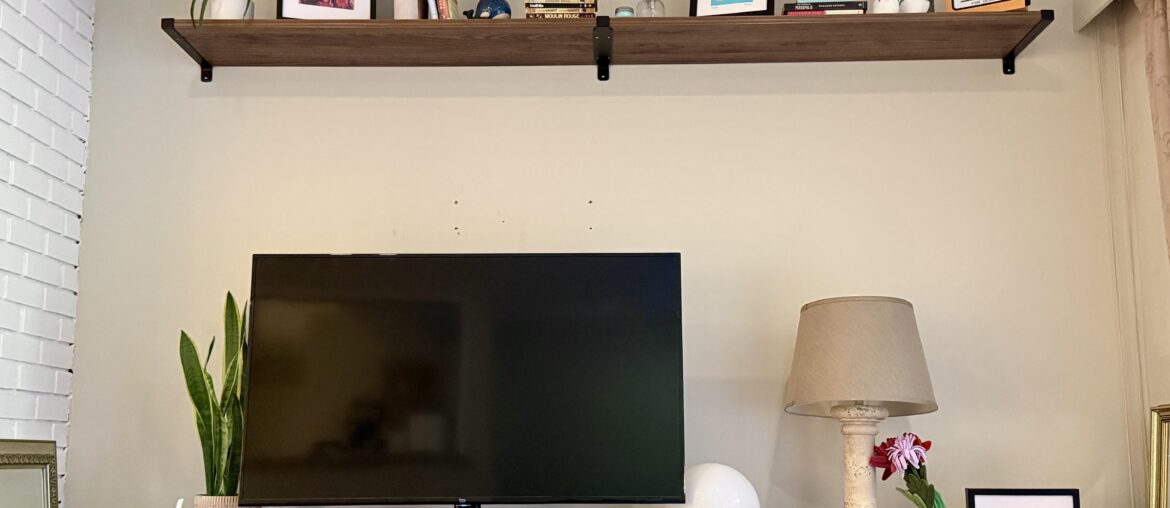Shelf too high. Reposition or add a second one below?