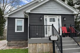 What color(s) should I paint the foundation and wood paneling below the front porch?