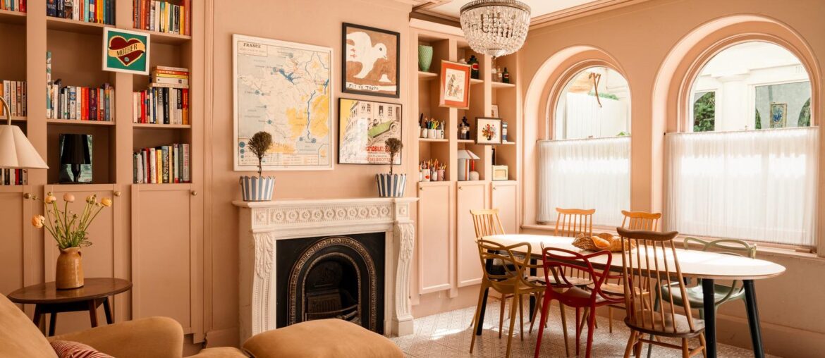 Dining table next to arched windows in a renovated Victorian villa, Portishead, Somerset, England [1600x1067]