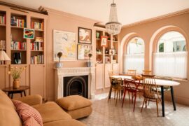 Dining table next to arched windows in a renovated Victorian villa, Portishead, Somerset, England [1600x1067]