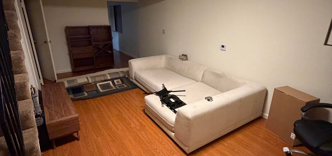 Trying to figure out how to make this living room work! Any advice?