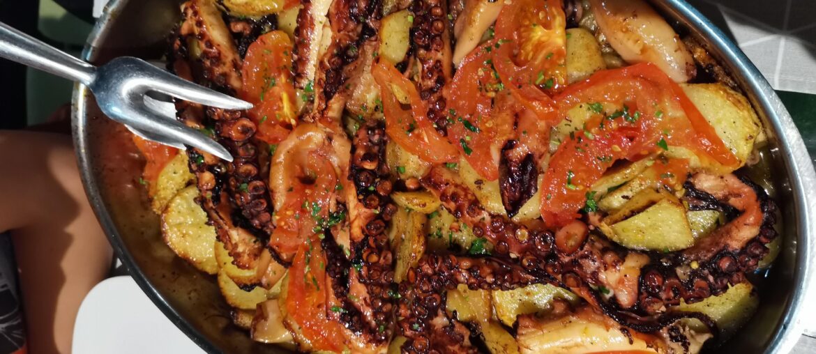 Octopus with potatoes and vegetables