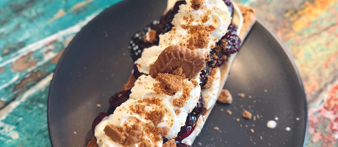 Warm ciabatta, cream cheese, warm cherry jam and whipped cream