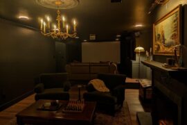 Would a large mirror and two sconces look good on this empty wall?