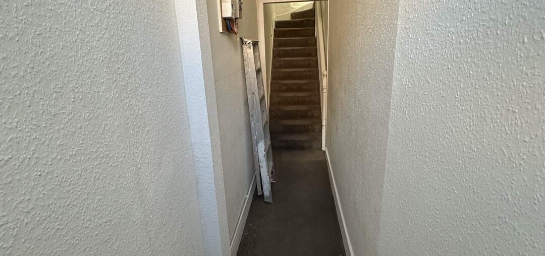 How to make this long entryway more appealing?