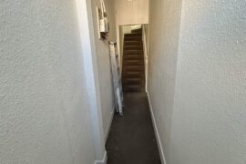 How to make this long entryway more appealing?