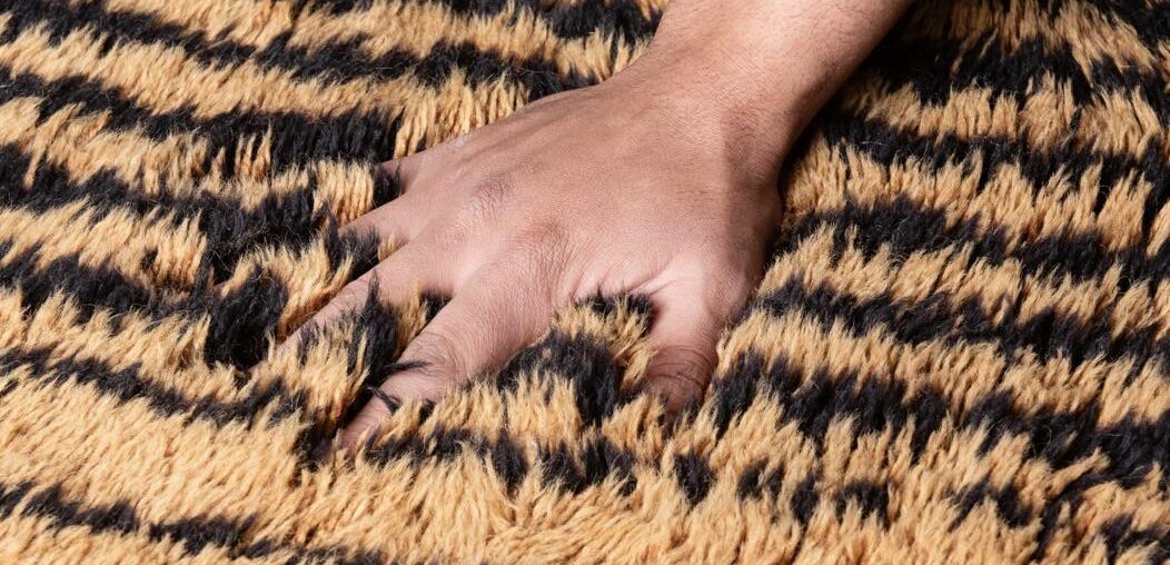 Are high pile plush rugs difficult to keep clean?