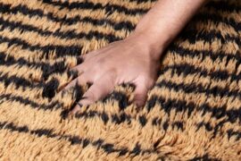 Are high pile plush rugs difficult to keep clean?