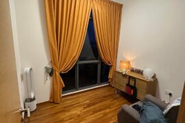 What rug colour should I go with to match the colours in this room? I plan to add floor chairs and a round coffee table