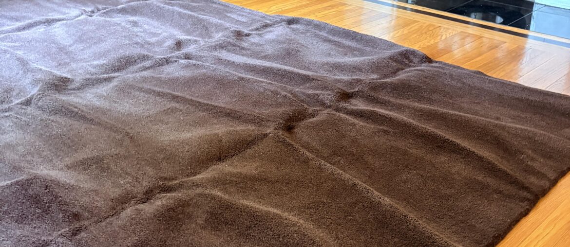 How to flatten a folded rug?