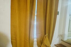 How do I hem the curtain on the far right?