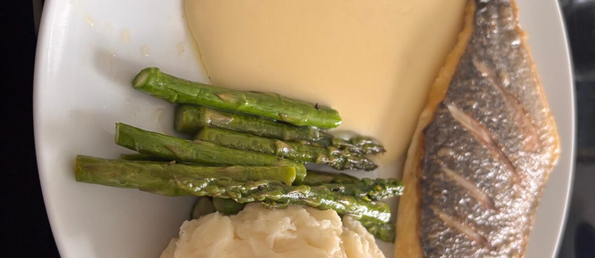 Pan fried sea bream, mash, asparagus with an over exuberant helping of slightly cheesy white sauce.