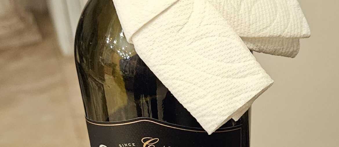 I make these little wine bottle cravats out of half a paper towel to prevent dripping.