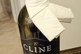I make these little wine bottle cravats out of half a paper towel to prevent dripping.