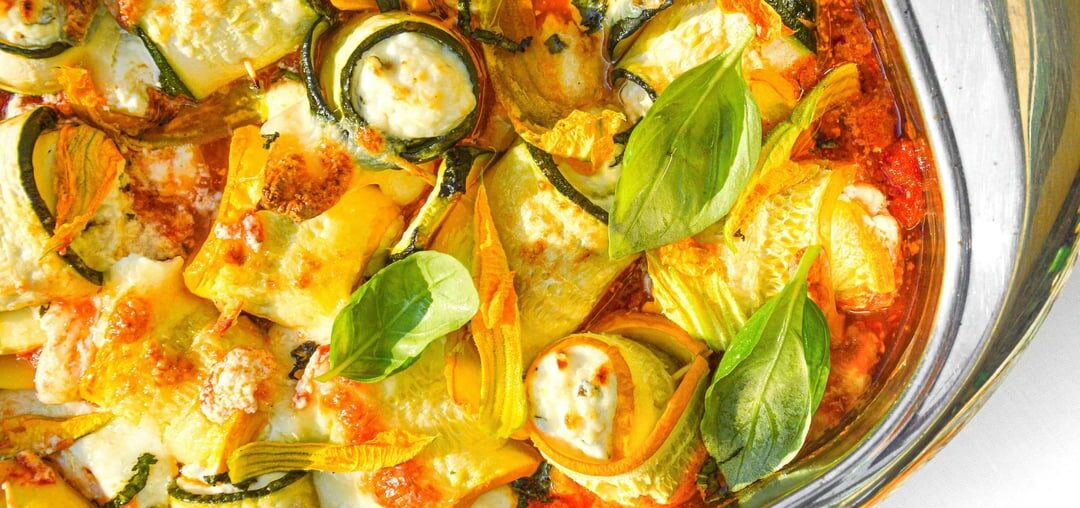Involtini di zucchine con ricotta e menta -  zucchini rolls stuffed with ricotta, mint & lemon zest baked in a tomato and basil sauce