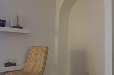 Need advice on wood and marble combo for a bar in this arch