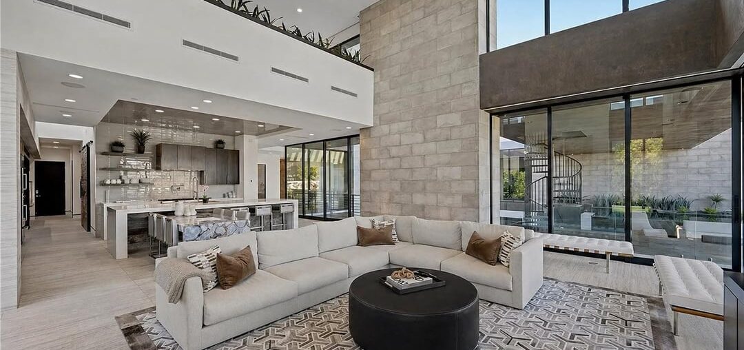 Do you guys like the black or the blue ottoman? Throw pillows too small? Thank you in advance!