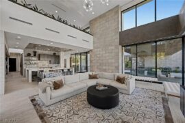 Do you guys like the black or the blue ottoman? Throw pillows too small? Thank you in advance!