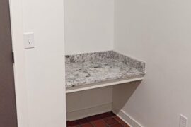 New apartment has this super random corner shelf. What should I do with it?