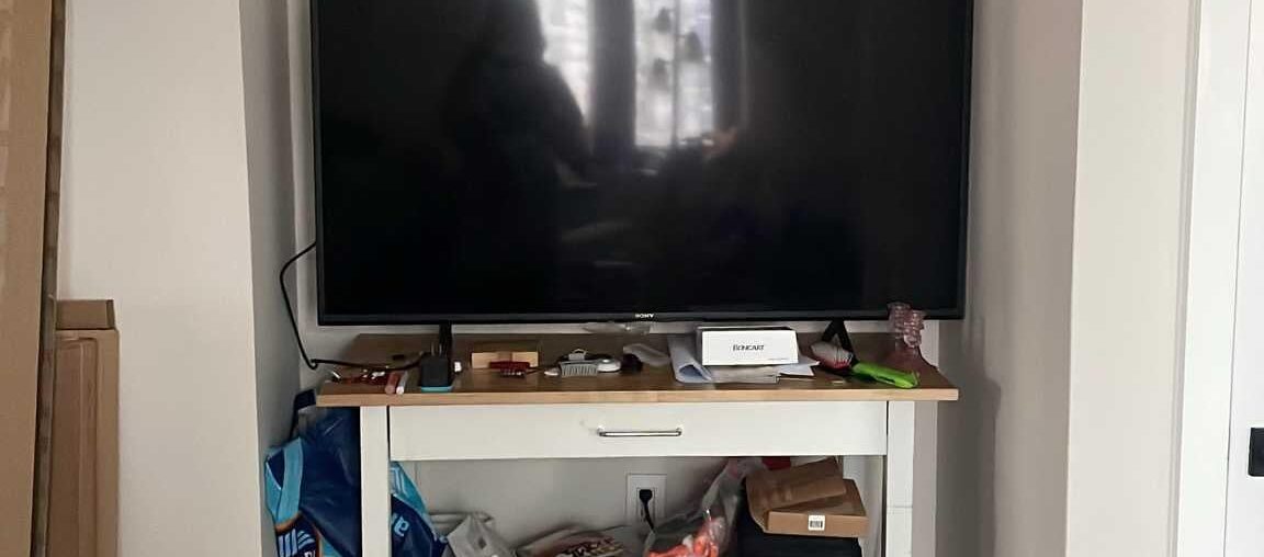 How to style this uneven indented wall with TV?