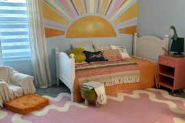 Update on my daughter’s room, chair and night stand aren’t working in my opinion.. what should I do above the headboard?