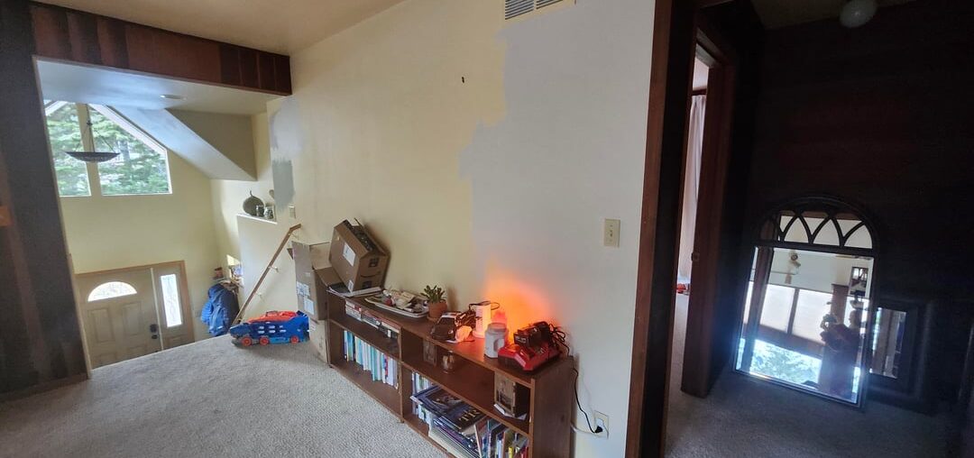 Struggling to find a creamy white paint color that doesn't go Grey or blue agaisnt wood paneling