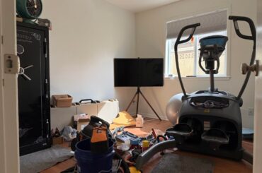 I reclaimed my husbands junk room to create a yoga room