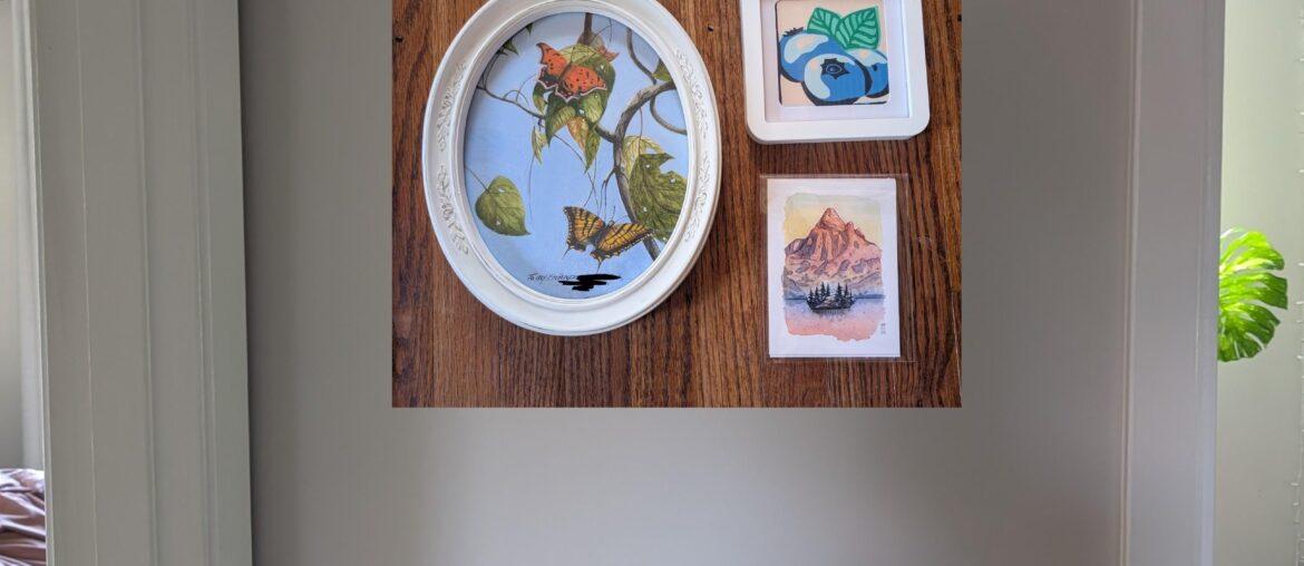 Help! How does this art collage look in this small hallway? How to improve/framing advice? Tia!