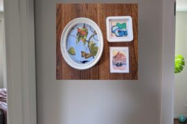 Help! How does this art collage look in this small hallway? How to improve/framing advice? Tia!