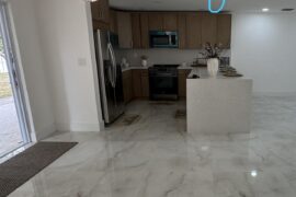 Looking to add 3 pendant lights over the counter with a couple of barstools. Should I match this other pendant light that a dining table will to below or go with a similar look? Any recommendations on what would match best?