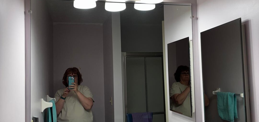 Any ideas on how to camouflage this medicine cabinet?