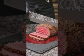 Premium Aged French Duck Breast with a crisp, cross-hatched skin and glossy gold-leaf.