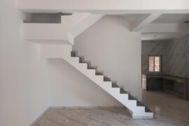 Give me suggestions for tv unit ideas in this main hall for my new home