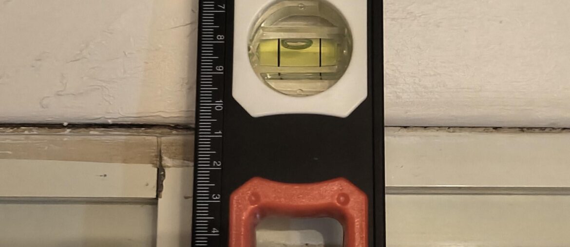 How do I hang a curtain with only 4.5cm of wall above the window?