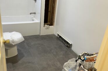 What color vanity and walls to warm up bathroom renovation?