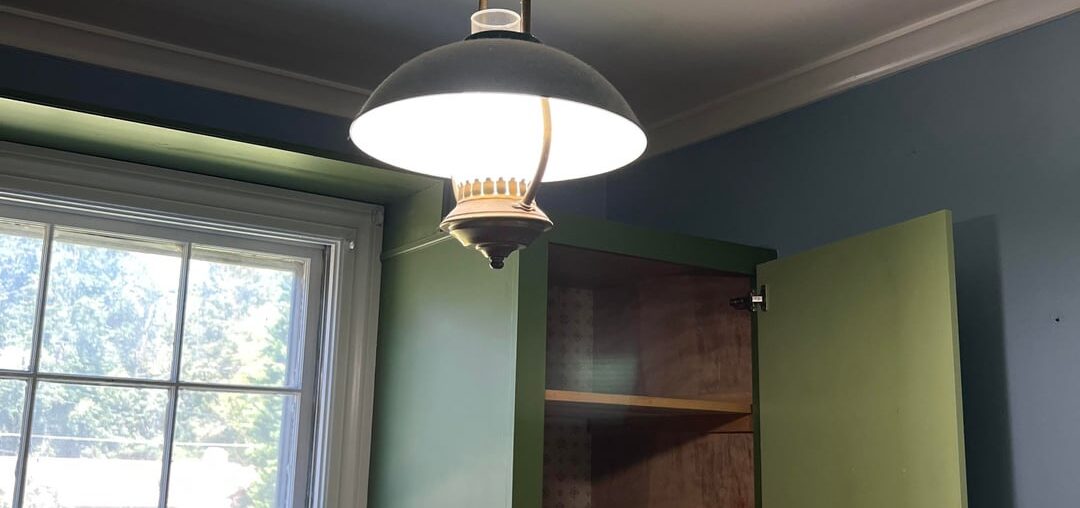 GREEN AND BRASS PENDANT LIGHT FIXTURE WITH FROSTED GLASS VINTAGE. WHAT IS IT WORTH?
