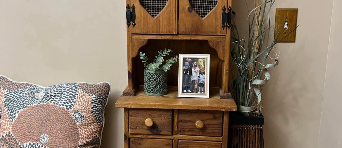 Cabinet with heart shaped cutouts