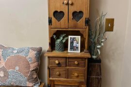 Cabinet with heart shaped cutouts