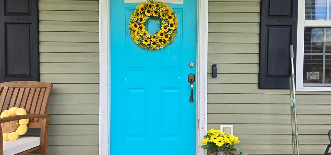 Should I paint my window boards the same color as my door?
