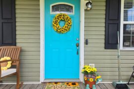 Should I paint my window boards the same color as my door?