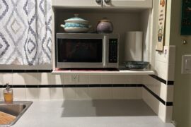Any ideas for this space under the microwave?