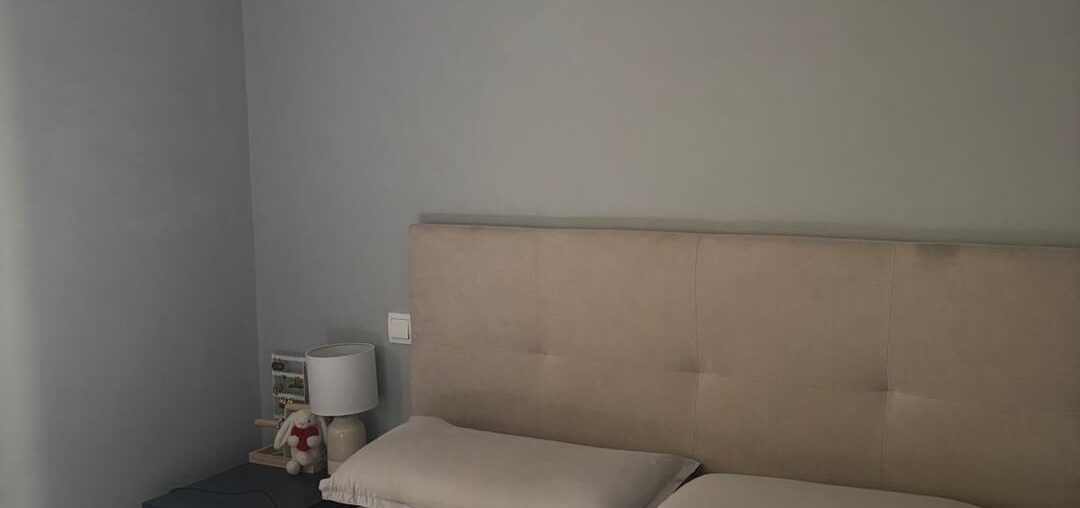 Is this headboard too big? What can I do to make it look better?