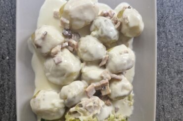 A simple dinner-new potatoes with a creamy sauce with smoked meat+some salad