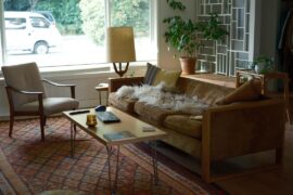 We just moved in here at the beginning of the month, had lots of touch ups on the walls to do so haven't hung much art yet - but beyond that what are we missing? I feel like the space between the couch and entry is a bit awkward.