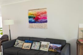 Help me fix the wall above the couch