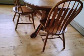 Help me find a 6 x 9 area rug for under my dining room table set. I just resurfaced my pine floors.