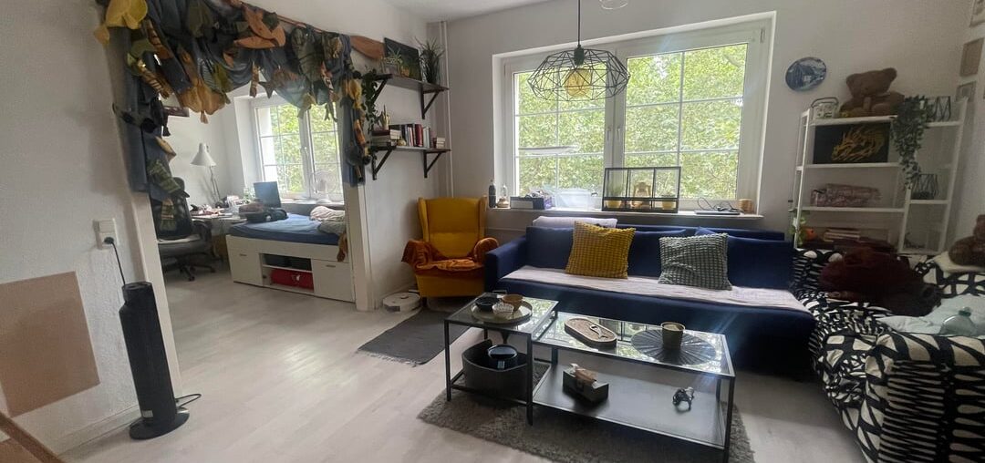 Moved here in a rush and only now have time to think about aesthetics. First picture is how it's been, second is how I've played with the rug. Any ideas? I feel like a bigger rug would make things more noisy.